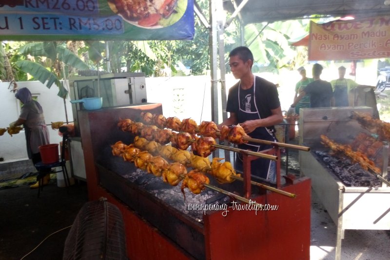 Grilling chicken at the Pasar Ramadhan