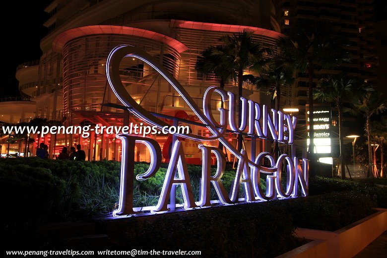 View of Gurney Paragon sign at night