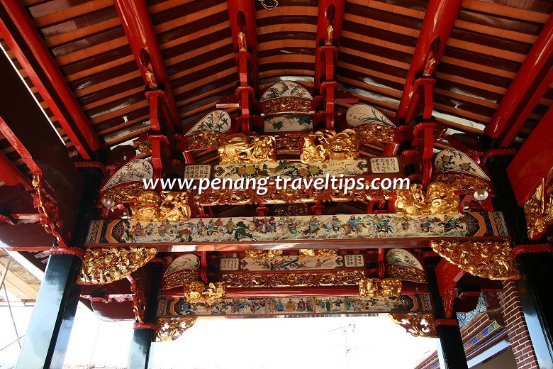 Intricate artwork on the ceiling beams reflect the artistry of the Chinese craftsmen