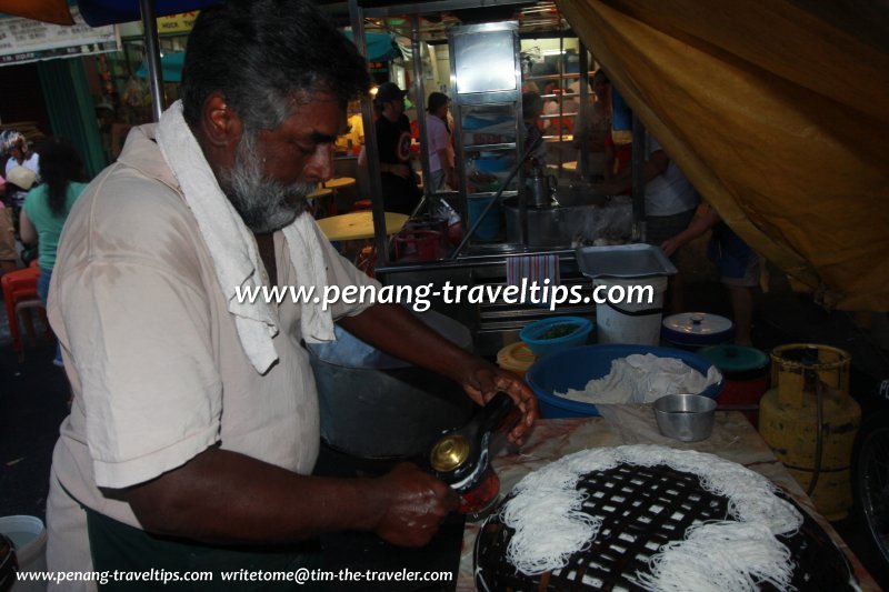 The uncle selling putu mayong at Jelutong Market