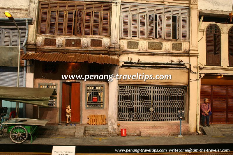 A hawker pushcart in front of 15 & 17 King Street