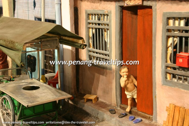 Child look out from door with ice-cream in mouth