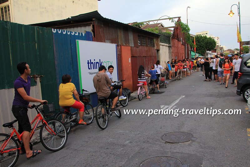 Queue at Little Children on a Bicycle mural