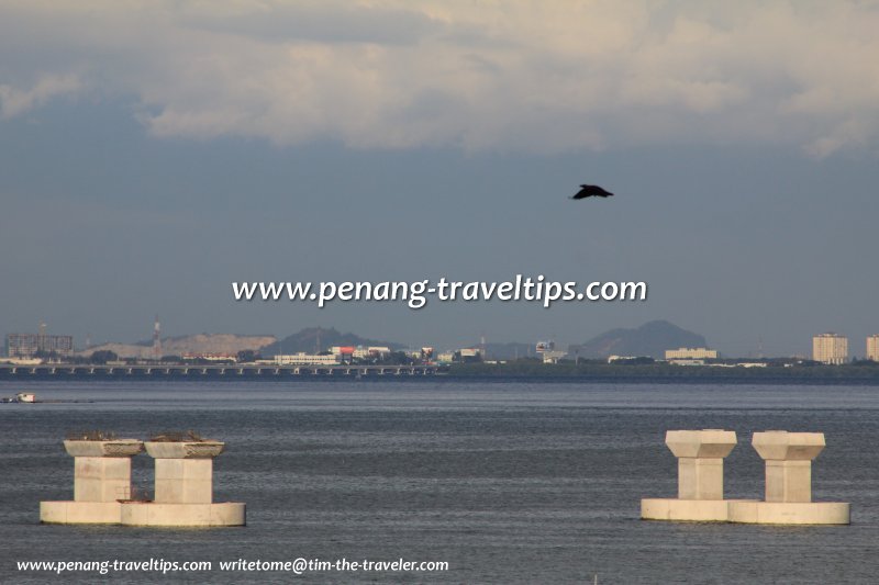 The Second Penang Bridge under construction, with the first Penang Bridge in the background